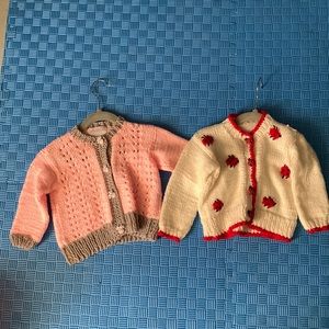 Two hand made little toddler “Knitted By” Sweaters, 18-24 mos.  Little girl